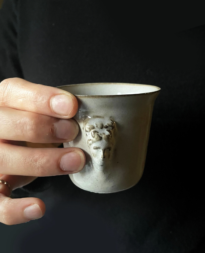 Aphrodite espresso cup — relief portrait